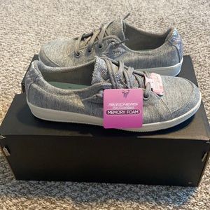 Size 6, gray slip on Skechers